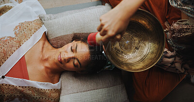 Buy stock photo Healer, woman and healing with singing bowl, hands and vibration for inner peace with mantra and above. Meditation, sage and sound therapy with instrument for awakening, chant and holistic for person