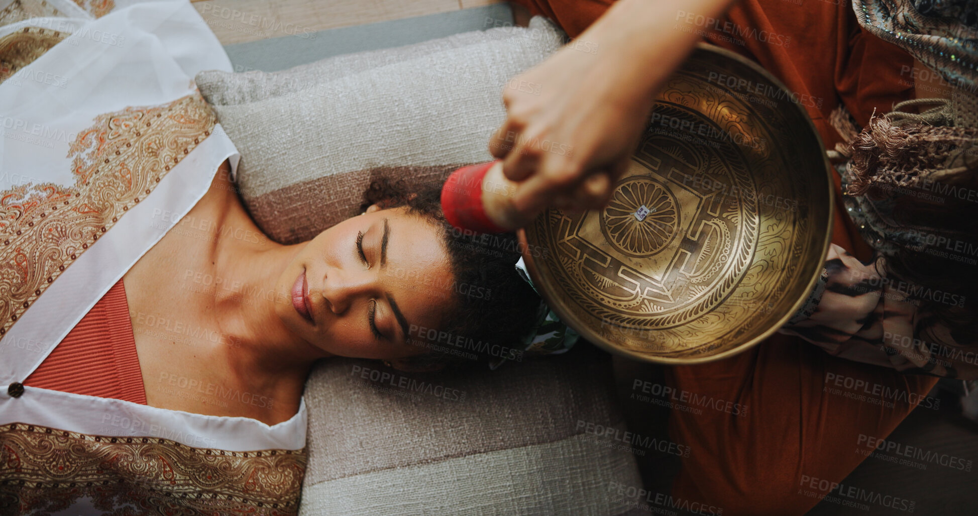 Buy stock photo Healer, woman and healing with singing bowl, hands and vibration for inner peace with mantra and above. Meditation, sage and sound therapy with instrument for awakening, chant and holistic for person