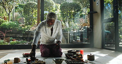 Buy stock photo Incense, alternative medicine and mature man on floor for spiritual meditation, holistic treatment and healing. Aromatherapy, cleanse and person with stones for balance, chakra and detox for wellness