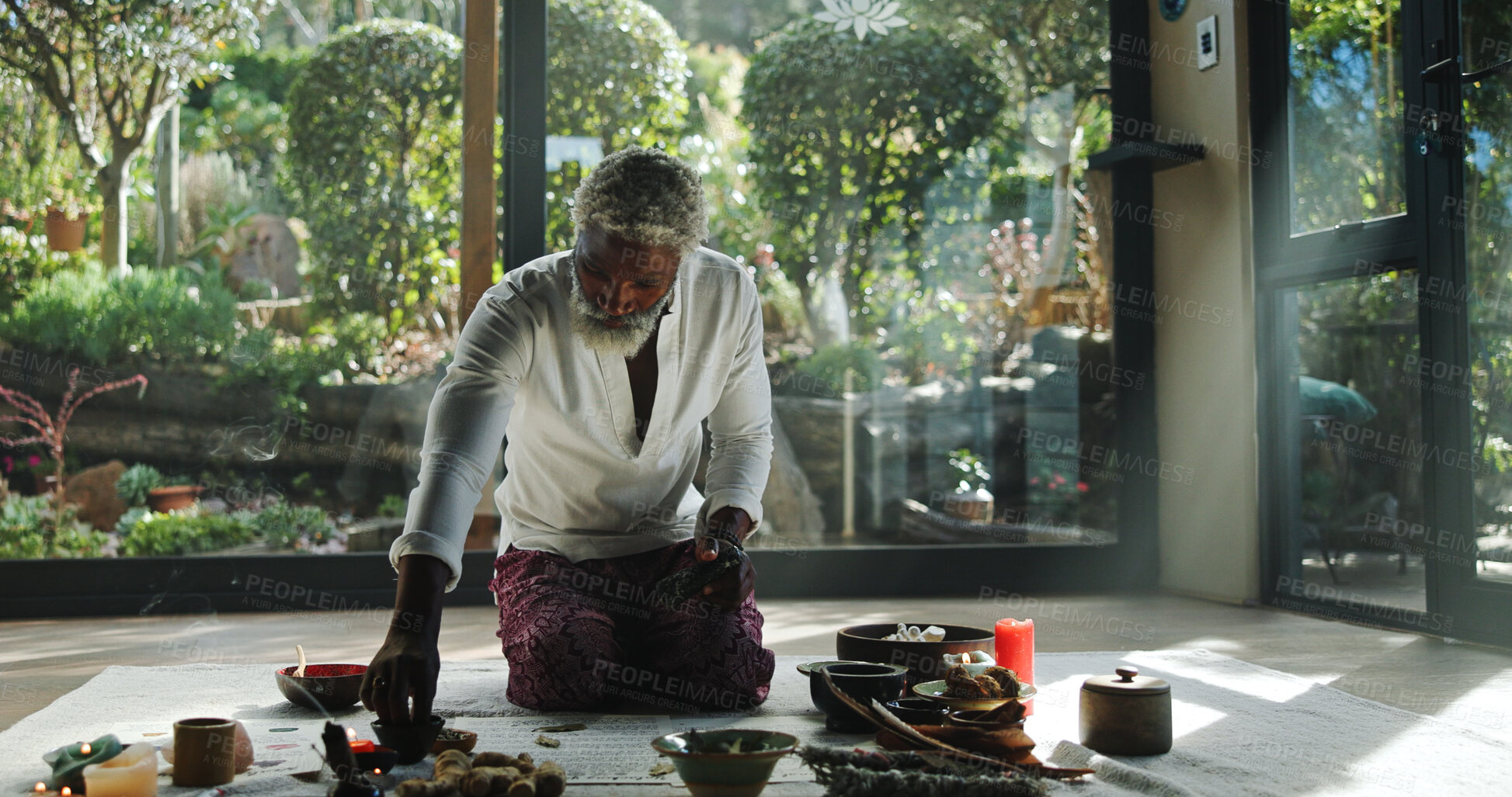 Buy stock photo Incense, alternative medicine and mature man on floor for spiritual meditation, holistic treatment and healing. Aromatherapy, cleanse and person with stones for balance, chakra and detox for wellness