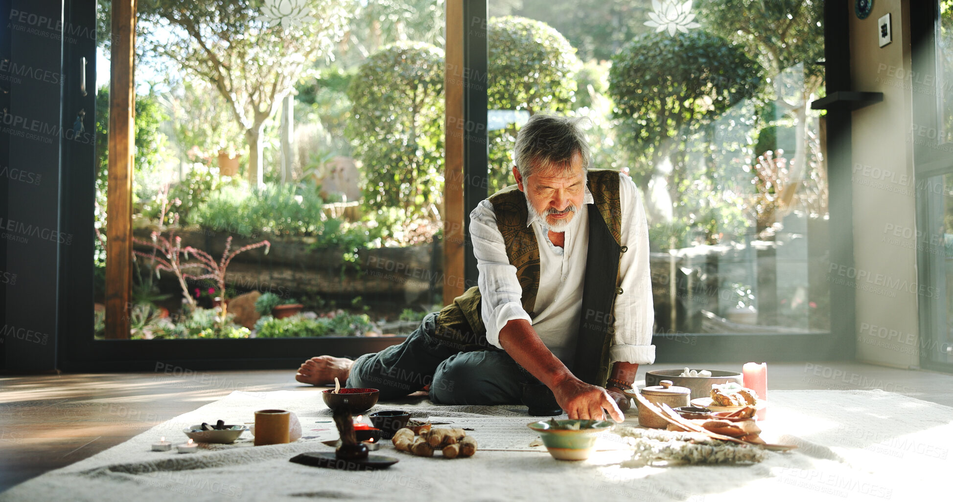 Buy stock photo Incense, alternative medicine and Asian man on floor for spiritual meditation, holistic treatment and healing. Aromatherapy, cleanse and healer with stones for peace, chakra and detox for wellness