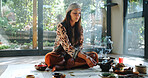Incense, alternative medicine and woman on floor for spiritual meditation, holistic treatment and healing. Aromatherapy, cleanse and person with stones for balance, chakra and detox for wellness