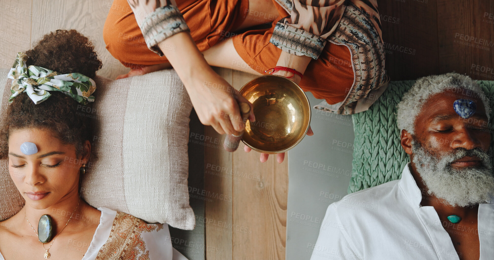 Buy stock photo Hands, person and bowl for Tibetan singing with people for healing, sound ritual and vibration therapy. Healer, soul music and instrument of indigenous meditation, spiritual mantra and chakra balance