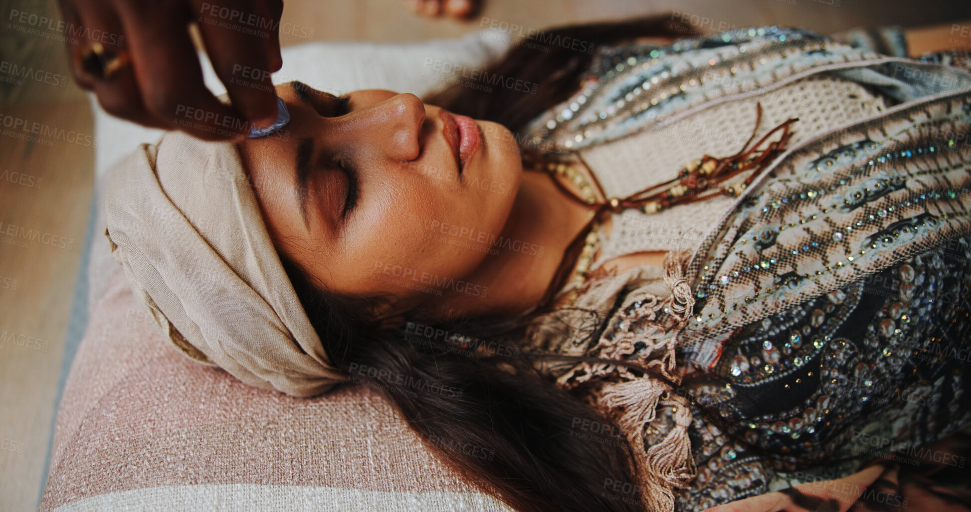 Buy stock photo Floor, healing and woman with healer, hands and ritual for self awareness, meditation and gemstone. Inner peace, chakra and zen with ceremony for soul, holistic and awakening of person with mantra