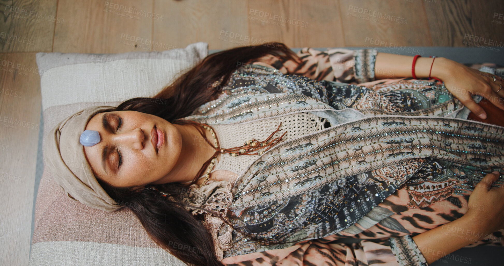Buy stock photo Woman, crystal and healing with chakra on floor, above and energy for therapy with rest on vacation. People, rocks and holistic care with mineral, mindfulness and peace for zen with balance at resort