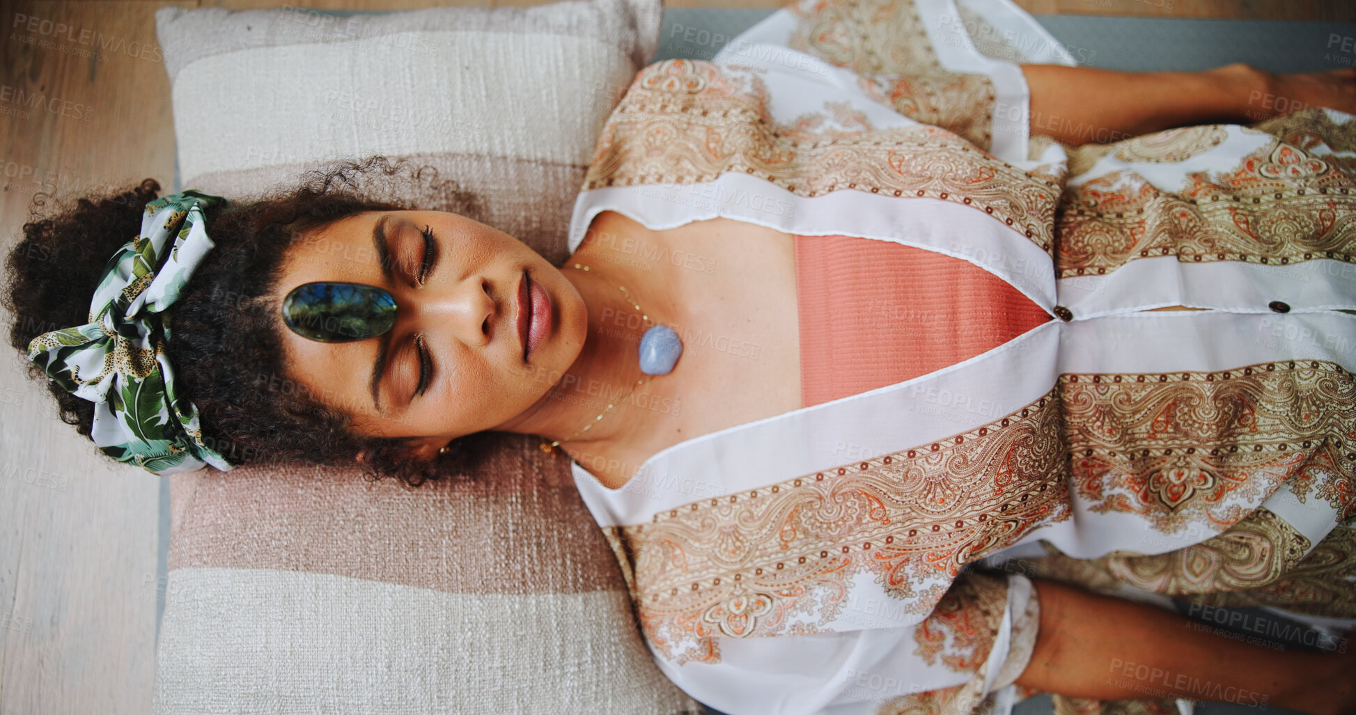 Buy stock photo Woman, crystal and chakra balance on floor, above and energy for therapy with rest on vacation. People, rocks and holistic care with mineral, mindfulness and peace with zen with healing at resort