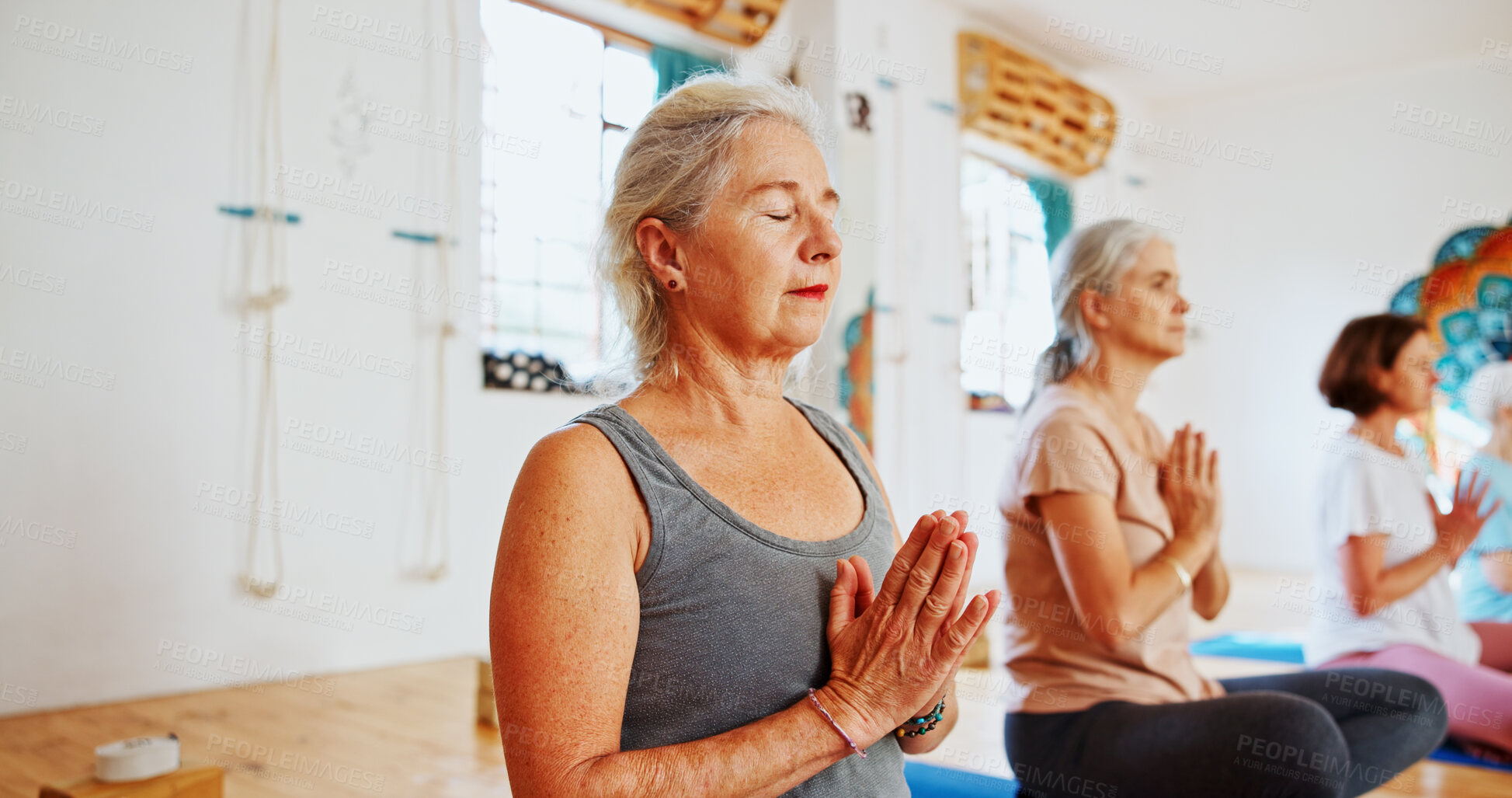 Buy stock photo Hands, namaste and senior women with meditation for calm mindset, zen or peace in mental wellness. Posture, morning and people in class together for mindfulness, relax or holistic self care in yoga