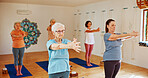 Yoga class, senior women and exercise with instructor, spiritual wellness and pilates with warm up. Elderly people, trainer and group in health club, stretching and fitness with retirement or balance