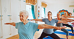Senior woman, group and stretching for yoga for zen, fitness exercise and spiritual wellness. Elderly people, warrior pose and community for pilates, holistic practice and body balance at health club