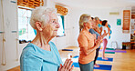Meditation, namaste and senior women in class for calm mindset, zen or peace in mental wellness. Posture, morning and mature people in group together for mindfulness, relax or holistic self care.