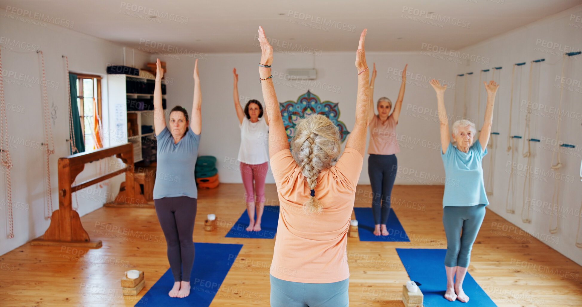 Buy stock photo Instructor, senior people and stretching in yoga class for zen, fitness exercise and spiritual wellness. Coach, teaching and group for pilates lesson, community and holistic balance at health club