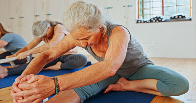 Buy stock photo Senior woman, stretching and legs in yoga class, flexibility and spiritual wellness. Elderly person, muscle warm up and community for pilates, holistic practice and mobility exercise at health club