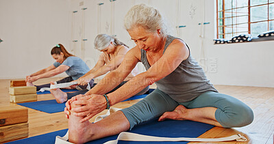 Buy stock photo Senior woman, stretching and feet in yoga class, flexibility and spiritual wellness. Elderly person, muscle warm up and community for pilates, holistic practice and mobility exercise at health club