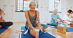 Senior woman, stretching and band for yoga class, flexibility and spiritual wellness. Elderly people, muscle warm up and community for pilates, holistic practice and mobility exercise at health club