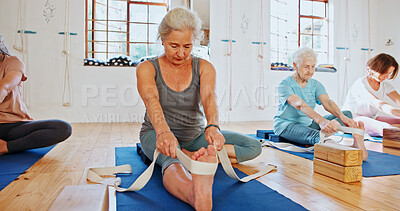 Buy stock photo Senior woman, stretching and band for yoga class, flexibility and spiritual wellness. Elderly people, muscle warm up and community for pilates, holistic practice and mobility exercise at health club