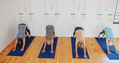 Buy stock photo Group, elderly and people stretching in yoga class for fitness, exercise and spiritual wellness. Senior women, warm up and downward dog pose for pilates, community and holistic balance at health club