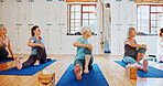 Group, elderly and people exercise for yoga of fitness, flexibility and spiritual wellness. Senior women, spinal twist pose or community for pilates, holistic practice and body balance at health club