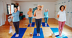 Yoga class, old women and stretching with instructor, spiritual wellness and pilates with fitness. Elderly people, pensioner and group in health club, help and balance with exercise and retirement