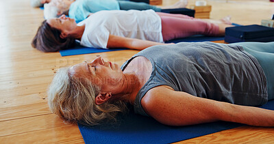 Buy stock photo Relax, meditation and senior woman in class for calm, wellness and mindfulness with inner peace. Self care, health and female person with breathing on yoga mat for holistic healing, zen or balance.