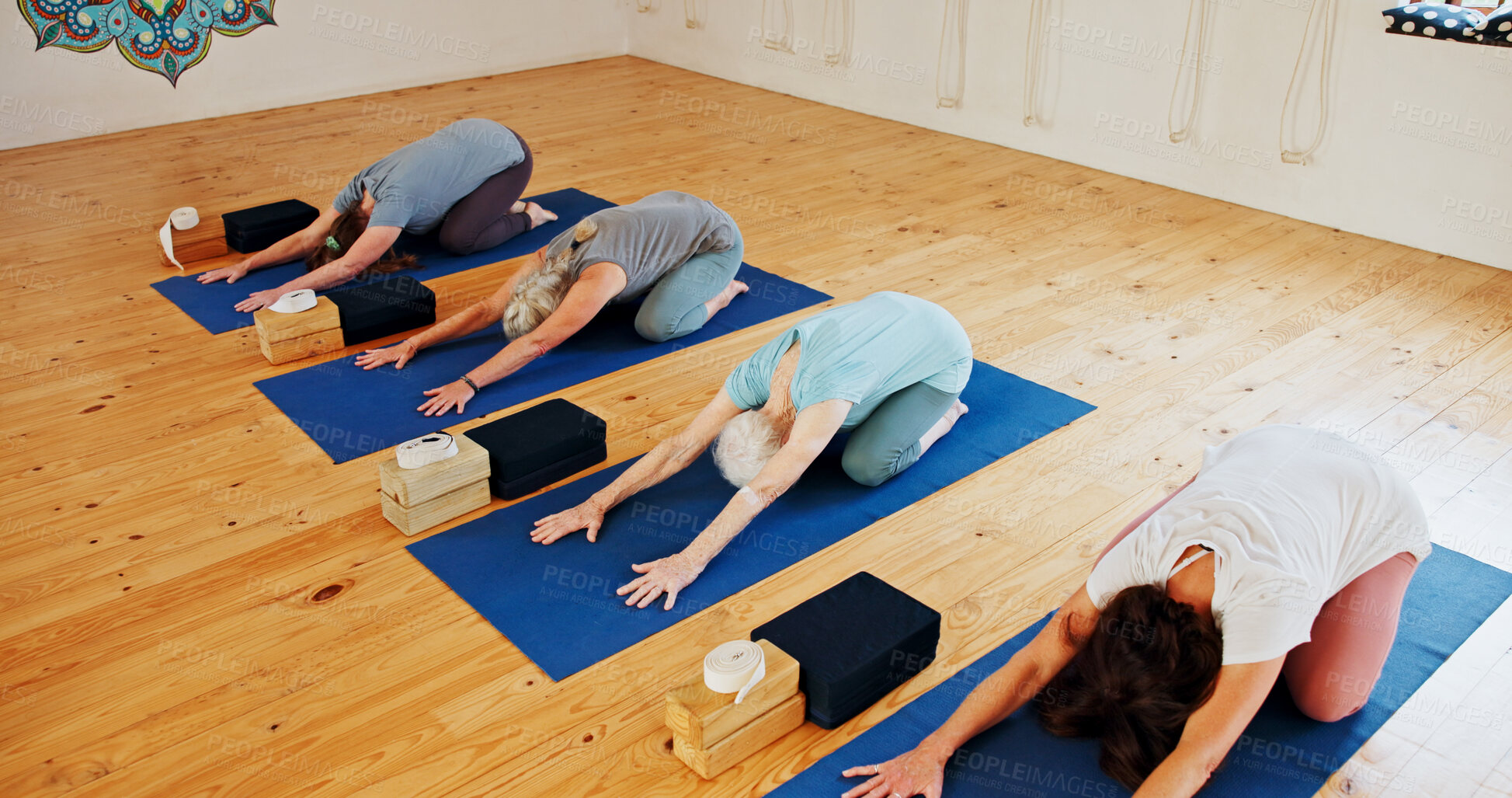 Buy stock photo Group, senior and people stretching in yoga class for fitness, exercise and spiritual wellness. Elderly women, warm up and childs pose of pilates lesson, community and holistic balance at health club
