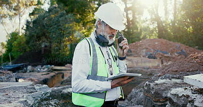 Buy stock photo Building, radio and tablet with construction worker man on site for communication, development or planning. Earmuffs, excavation and hardhat with builder person outdoor for industrial engineering