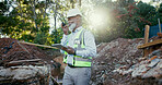 Building, radio and tablet with black man developer on site for communication or planning as construction worker. Architecture, development and hardhat with person outdoor for industrial engineering