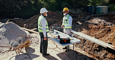 Buy stock photo Outdoor, people and team on construction site for planning, discussion and engineering collaboration. Architect men, building blueprint and meeting at worksite for brainstorming, compliance and PPE