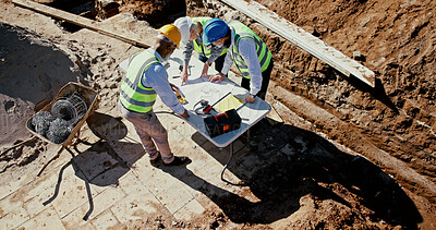 Buy stock photo Above, blueprint and team on construction site for planning, check design and engineering collaboration. Architect people, building layout and outdoor in meeting for brainstorming, compliance or PPE