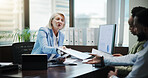 Woman, documents and business people for finance at office, review or feedback with charts by computer. Mature mentor, accounting and discussion with team, inspection and planning at corporate agency
