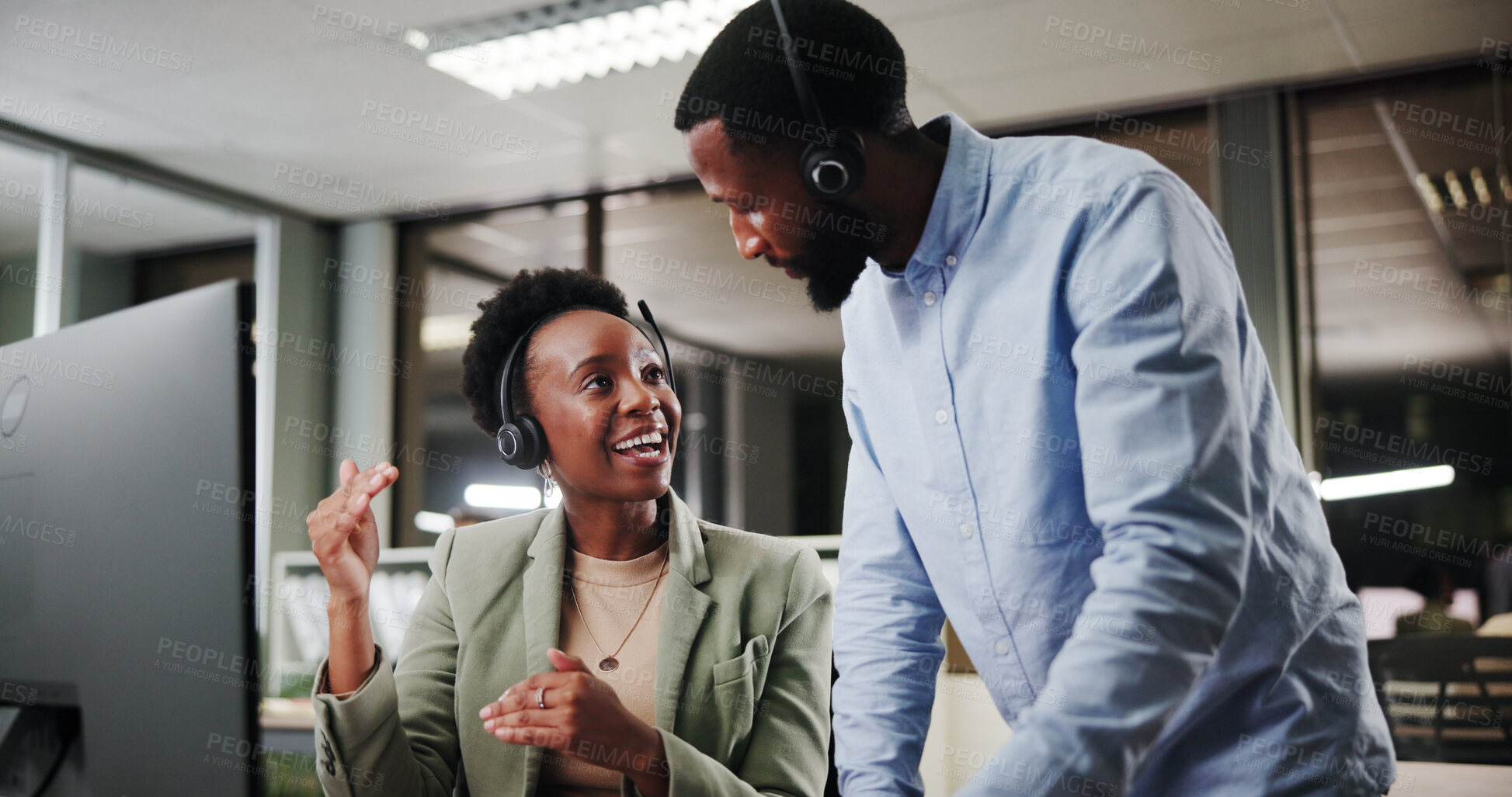 Buy stock photo Call center, team and African people training with mentor for customer service, sales or crm at night. Smile, contact us and telemarketing manager on computer for discussion, help or teaching intern
