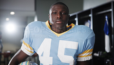 Buy stock photo Black man, football player or portrait in locker room with confidence, gear or ready for tournament. National sport, fitness or athlete in cloakroom with pride, game preparation or competition in USA