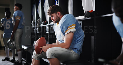 Buy stock photo Thinking, football player and sports with ball in locker room for preparation, match and game plan. Athlete, man and waiting for half time of competition strategy, fitness challenge and tournament 