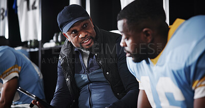 Buy stock photo Man, American football player and coach with talk in locker room, tablet and advice for performance. Mentor, professional athlete and discussion for fitness, sports and planning with quarter back