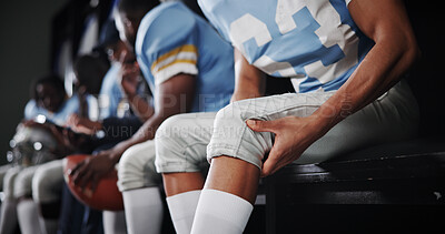 Buy stock photo Knee pain, injury and football player in locker room for fitness accident, fibromyalgia or fracture. Legs, inflammation and man for game with health issue, tension or pressure with massage for relief