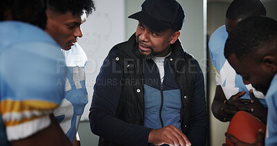 Buy stock photo Meeting, coaching and football with team in locker room for game plan, sports strategy or defense formation. Touchdown tactics, match feedback and discussion with people and advice for training