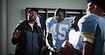 Advice, coaching and football with team in locker room for game plan, sports strategy or defense formation. Touchdown tactics, match feedback and discussion with people talking for training mentor