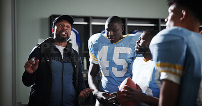 Buy stock photo Advice, coaching and football with team in locker room for game plan, sports strategy or defense formation. Touchdown tactics, match feedback and discussion with people talking for training mentor