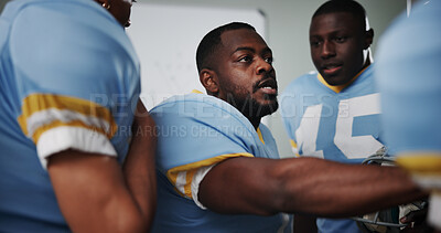 Buy stock photo Black man, group and players huddle for football motivation, sports meeting and game plan in locker room. People, preparation and strategy for match, half time advice and tactics of defence formation
