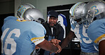 Hands together, support and football with coach and team in locker room for game plan, sports and motivation. Solidarity, match feedback and trust with people and huddle for mentor and goals