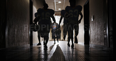 Buy stock photo Light, football and running and team in corridor for sports competition, stadium match and game. Fitness, pro league player and athlete with people in tunnel for training, tournament and contest
