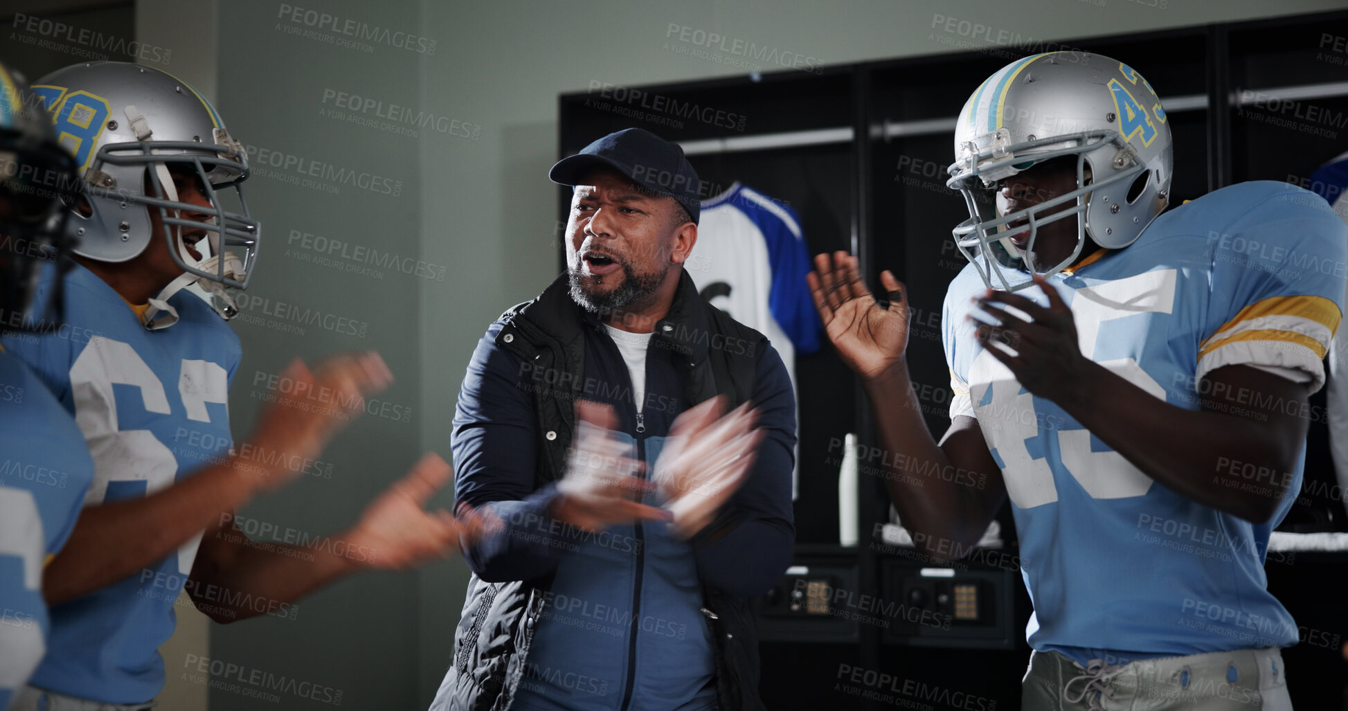 Buy stock photo Applause, support and football with coach and team in locker room for game plan, sports and motivation. Solidarity, match feedback and trust with people and huddle for mentor, success and goals