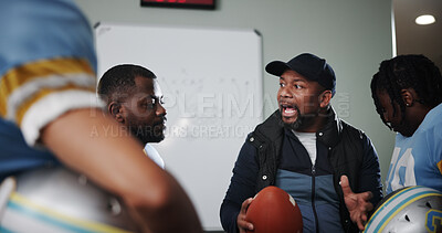 Buy stock photo Mentor, man and football with coach and team in locker room for game plan, sports strategy or defense formation. Touchdown tactics, half time feedback and discussion with people and match advice