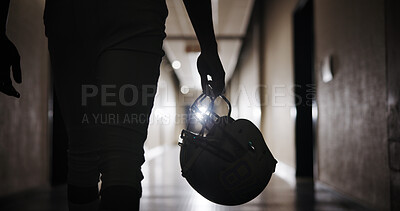 Buy stock photo Helmet, football and hands of man in corridor for sports competition, stadium match and game. Fitness, pro league player and athlete with person in tunnel for training, tournament and contest