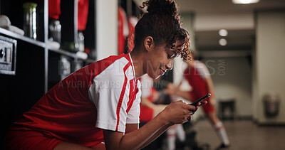 Buy stock photo Fitness, watching and woman with smartphone, smile and browsing of video on social media and online. Happy, football player and person with mobile for streaming, healthy and girl with sportswear