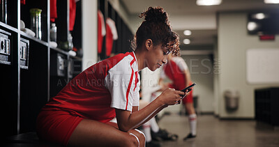 Buy stock photo Locker room, online and woman with smartphone, smile and browsing of video on social media and  watching. Happy, football player and person with mobile for streaming, healthy and girl with sportswear