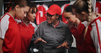 Buy stock photo Women, coach and discussion with soccer players for match or game plan in locker room. Female people, coordinator or talking with football group for team formation, ideas or sport strategy together