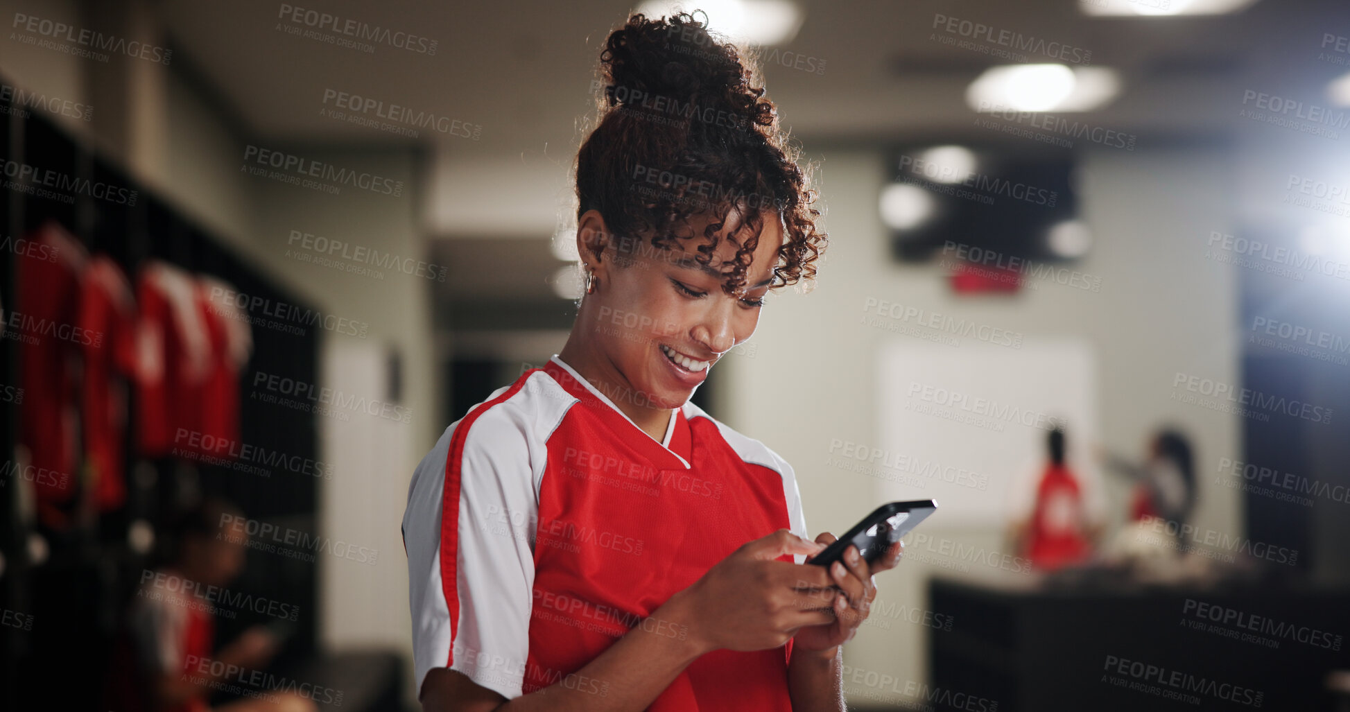 Buy stock photo Sport, girl and smile in locker room with mobile, social media and check training schedule. Football player, woman and happy with phone for good news, league acceptance or favorite soccer team update