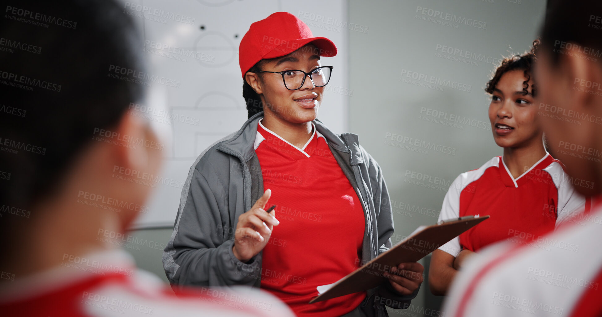 Buy stock photo Women, coach and talking with soccer team for game plan, strategy or discussion together. Female people, trainer or coordinator meeting with clipboard, group or players for sport match or formation