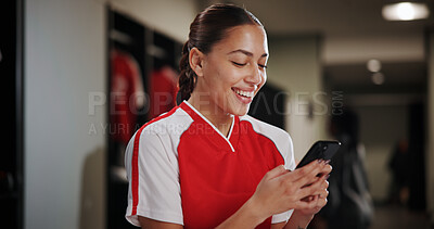 Buy stock photo Sport, woman and smile in locker room with mobile, social media and check training schedule. Football player, girl and happy with phone for good news, league acceptance or favorite soccer team update