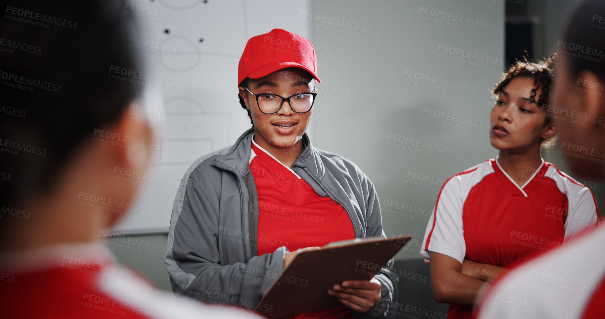 Buy stock photo Women, coach and soccer team with clipboard for game plan, strategy or meeting together. Female people, trainer or coordinator talking to group of professional sport players for match or formation